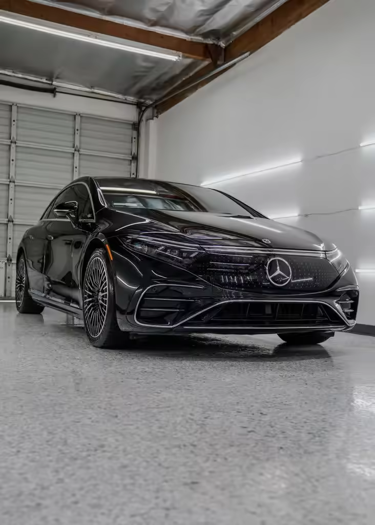 Black Mercedes with tinted windows