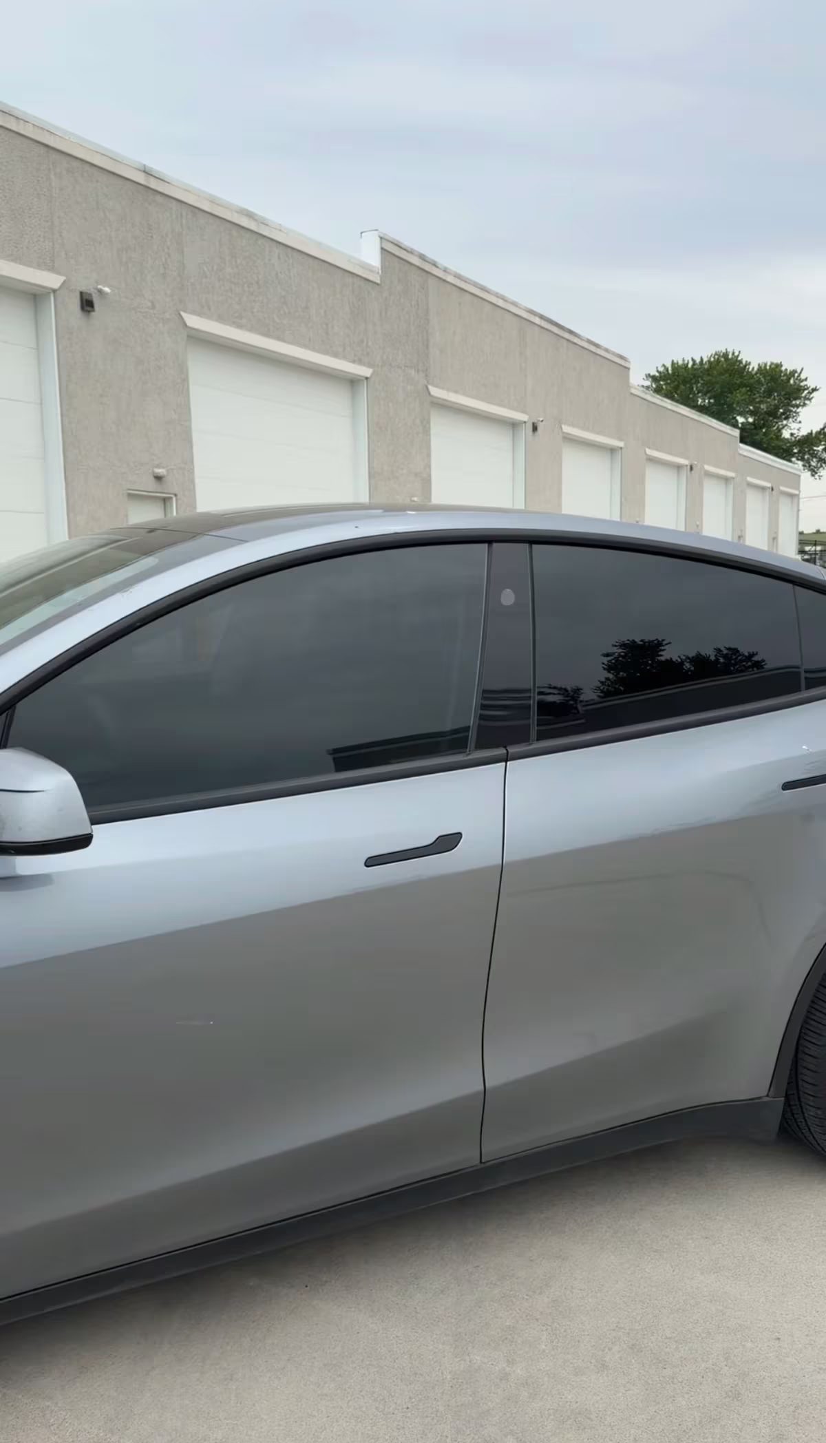 Silver sedan with professionally tinted windows